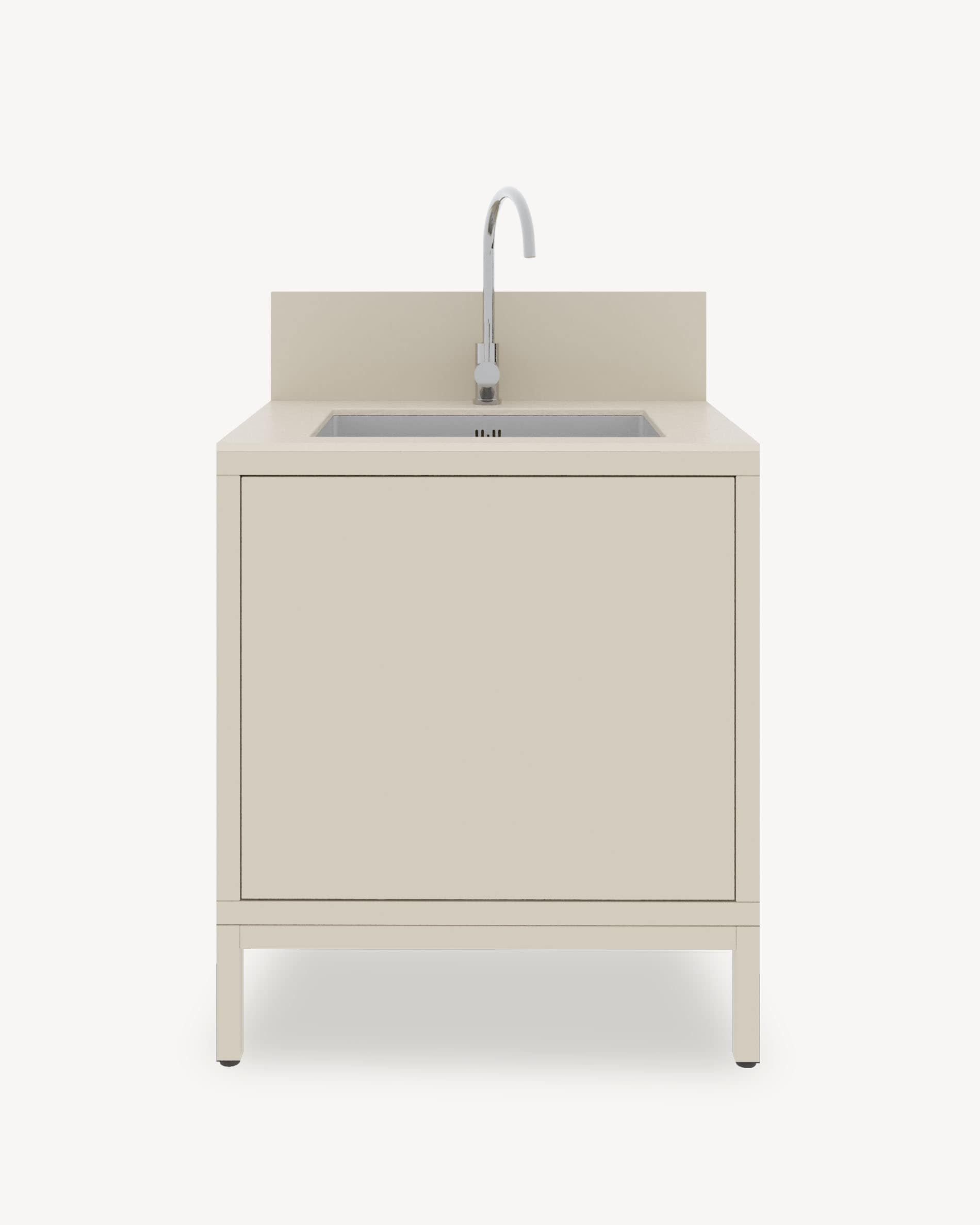 Küchenmodul auf Stelzen mit integriertem Spülbecken, Schrank in Cremefarbe mit geschlossenem Stauraum, dunkle Arbeitsplatte und integrierte Rückwand.