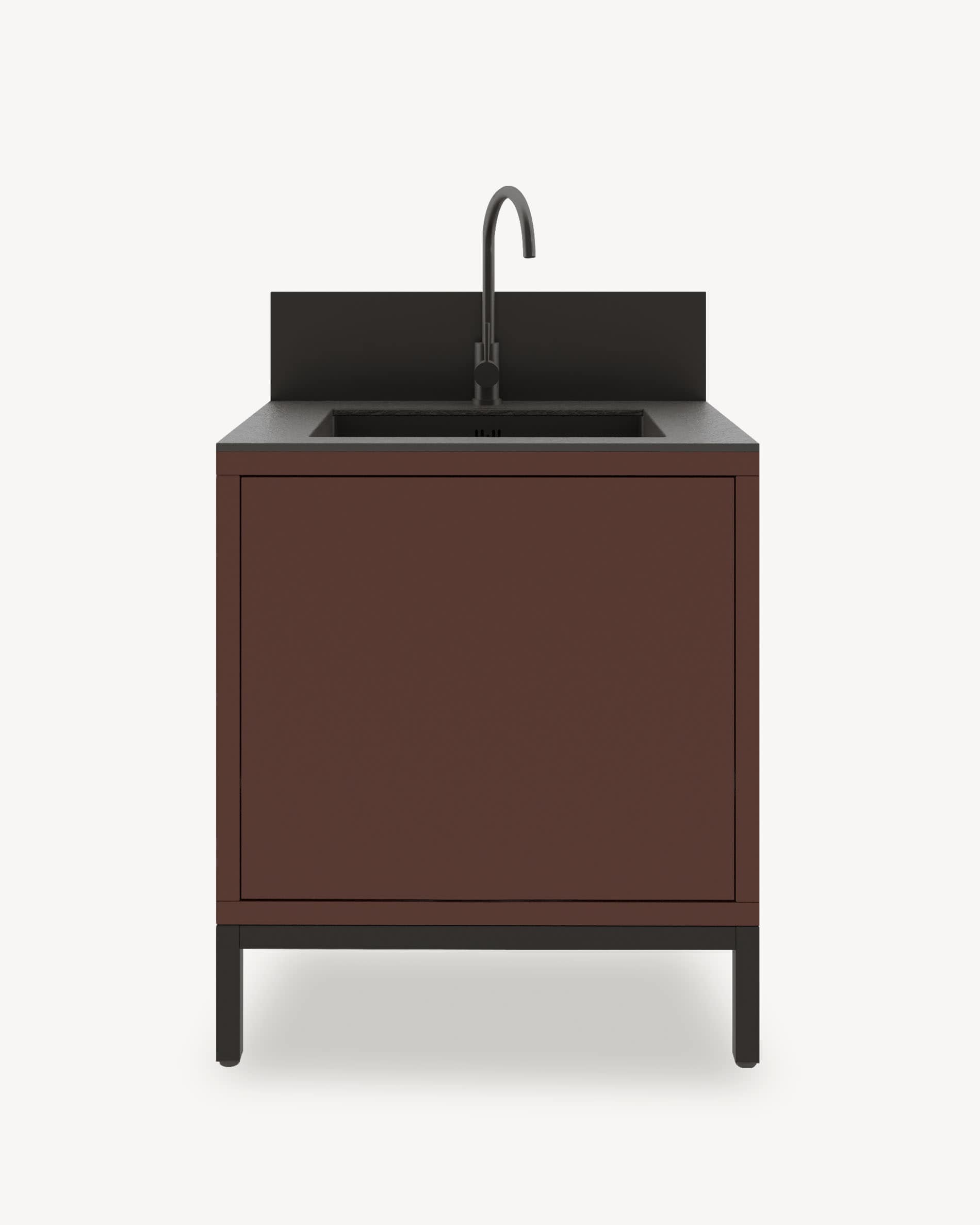 Küchenmodul auf Stelzen mit integriertem Spülbecken, Möbel in rostbrauner Farbe mit geschlossenem Stauraum, dunkle Arbeitsplatte und integrierte Rückwand.